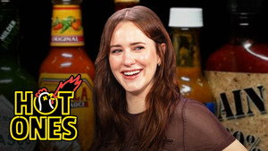 Rachel Brosnahan Flies Through The Air While Eating Spicy Wings